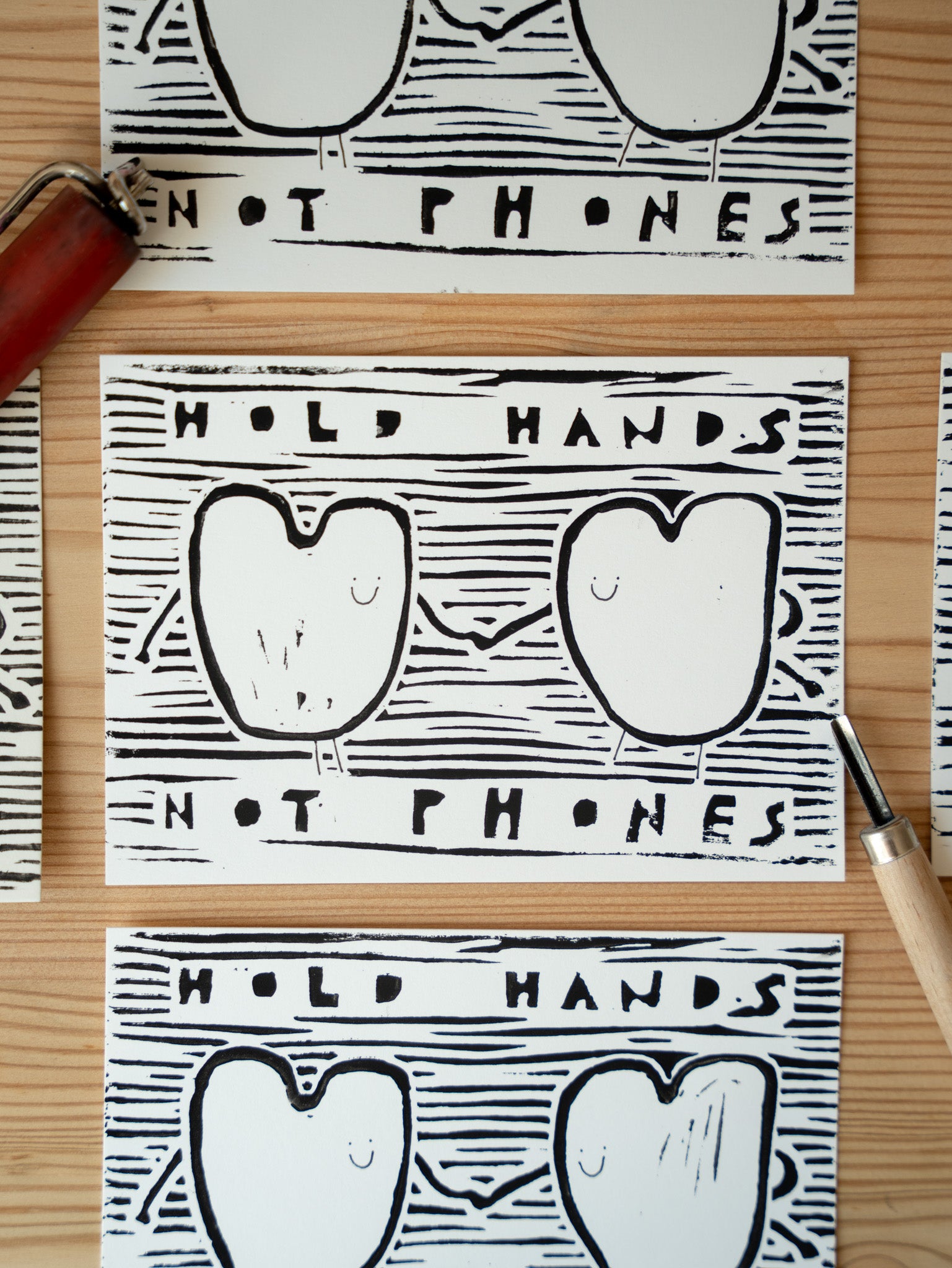 Hold hands not phones - Linoldruck